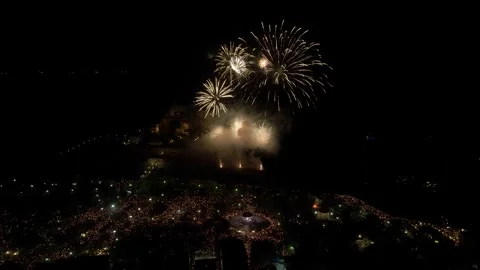 Aerial Corfu Easter resurrection small and big fireworks over crowded main Stock Footage 226163592