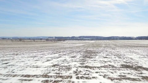Aerial corn field covered in snow Vídeos de archivo 73487700