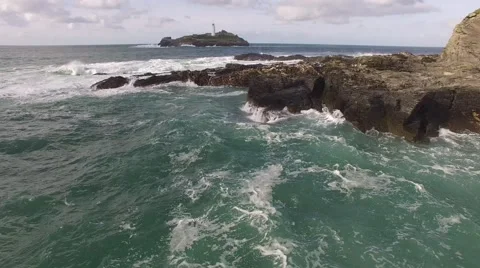 Aerial Cornwall sea side with Light house Stock Footage 65193192