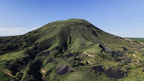 Aerial Counter Orbit Of Rugged Volcano Cinder Cone 8K HLG Stock Footage 343999890