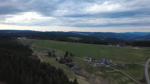 Aerial countryside landscape panorama with fields forest and hills Stock Footage 332762286