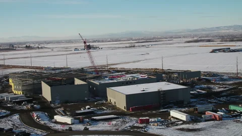 Aerial of a crane on a construction project Stock Footage 284967489