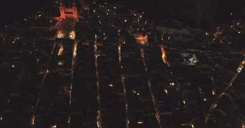 Aerial crane down tilt up looking towards Cefalu Stock Footage 76969557