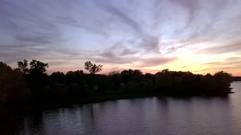 Aerial crane view of a dramatic sunset over the Thousand Island river Stock-Footage 137245395