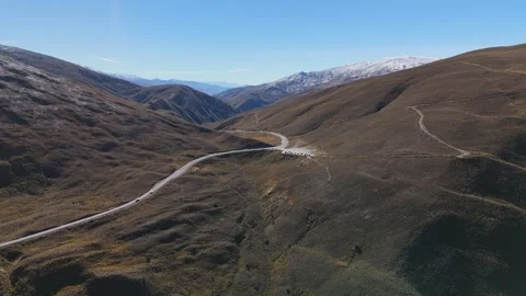 Aerial of Crown Range Pass Tussock Mountains Stock-Footage 333970944