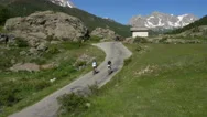 Aerial Of Cyclist Cycling On Road Stock Footage