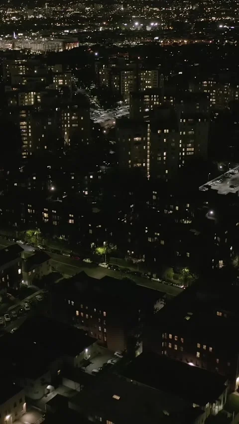 AERIAL: Dark Apartment Towers , Complex in Hollywood Los Angeles, California at Stock Footage 337413438