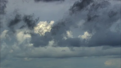 Aerial of dark clouds moving in the sky, Beautiful layers of black and white Stock Footage 109138049