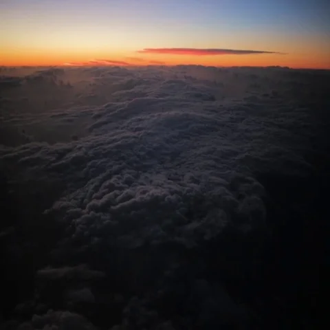 Aerial of dense clouds from above at sunset Vidéo 69454518