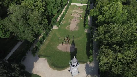 Aerial descending view Beyaert Tower Cinquantenaire Park Stock Footage 338434071