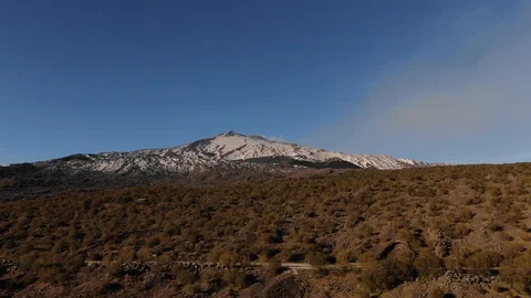 Aerial descending view over of  the summit of mount Etna in Sicily (Italy) Stock Footage 105682083