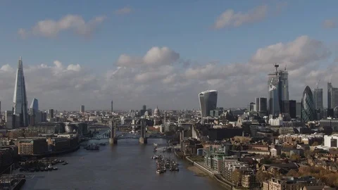 Aerial descending view of Tower bridge and the City of London Stock Footage 101204468