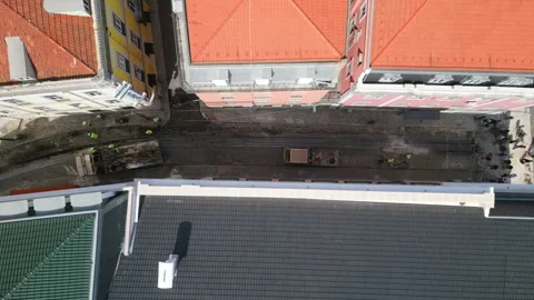 Aerial descending view on workers cleaning the tracks after the tragic accident Stock Footage 316748376