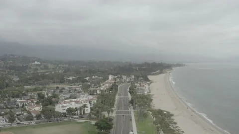 Aerial descends over E Cabrillo Blvd in Santa Barbara on cloudy day Stock-Footage 150427231