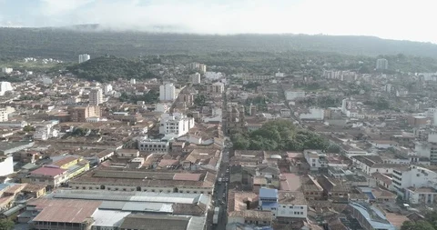 Aerial descends while looking at the quaint Colombian town of San Gil Stock-Footage 95614119