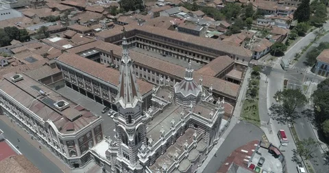 Aerial descends while tilting up on steeple of Nuestra Señora del Carmen church Stock-Footage 94911853