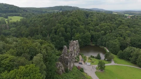Aerial Descent From A Distant Externsteine Spire 스톡 동영상 339367725