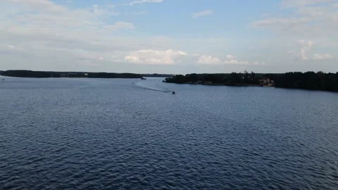 Aerial descent over river with forward drone motion Stock Footage 333544719