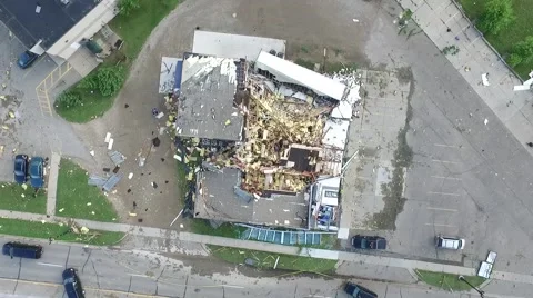 Aerial descent over tornado damage, wreckage aftermath, destroyed building Stock Footage 56281374