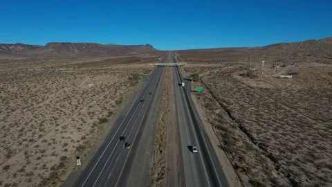 Aerial desert interstate freeway traffic California Nevada area 4K Stock Footage 99731082