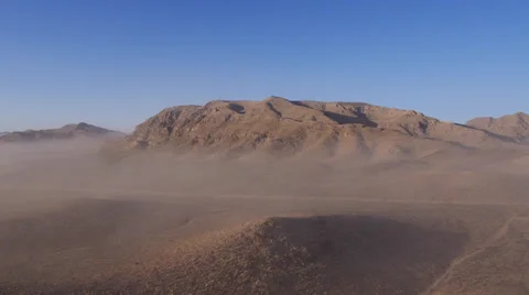 Aerial Desert Low Altitute Mountain Reveal Mist Stock Footage