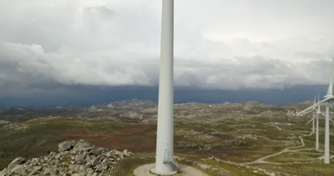 Aerial detailed view, by drone, of a wind turbines on top of mountains Stock Footage 105679271