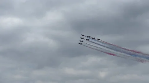 Aerial display team trailing smoke at an airshow Stock Footage 239653959