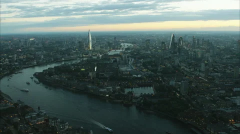 Aerial distant sunset view of the River Thames and city skyline of London UK Video stock 68064314