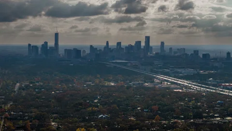 Aerial Distant View of the Downtown Austin Skyline Under Dramatic Clouds Texas Stock Footage 328118476