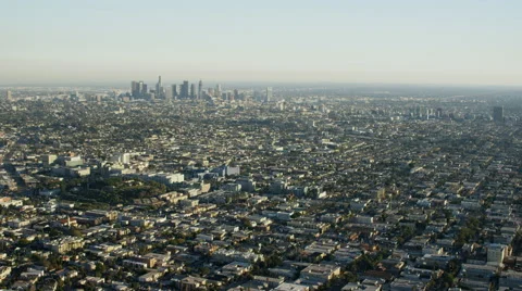 Aerial distant view of tall skyscraper buildings Los Angeles USA Stock Footage 64785977