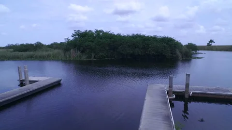 Aerial of Dock in the Florida Everglades Stock Footage 61744599