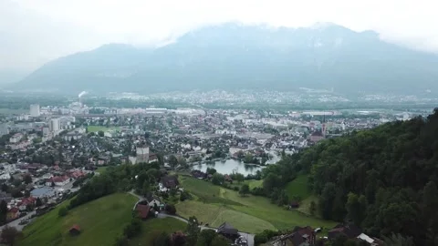 Aerial dolly backward flight around the castle of Werdenberg in Buchs Stock Footage 156244997