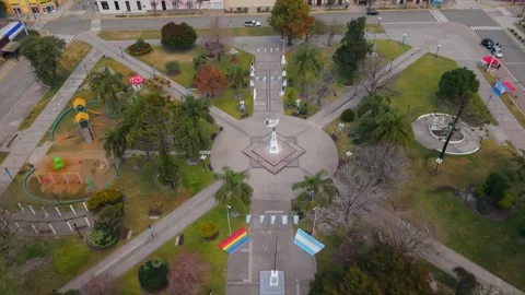 Aerial Dolly In Independence Square Local Argentine Flags San Jose de Feliciano Stock Footage 343895373