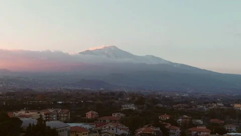 Aerial dolly view of mount Etna with snow at sunset (Sicily) Stock Footage 104601782