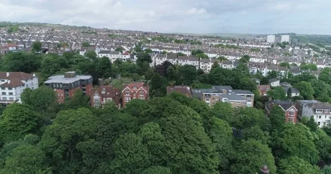 Aerial dolly view of the West part of the town of Brighton Stock Footage 77565580