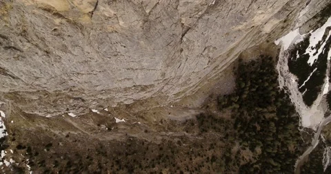 Aerial of Dolomites, top down view or mountain side, Spring landscape, Vertigo Stock Footage 132104699