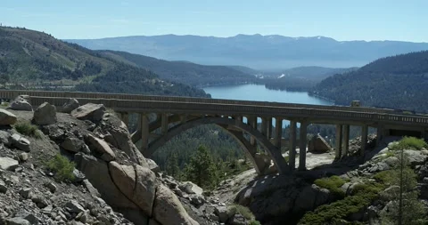 Aerial of Donner Summit Bridge and Donner lake in Sierra Nevadas Stock Footage 203879005