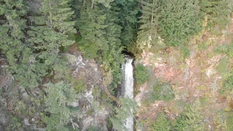 Aerial down of Rainbow Falls waterfall, Harrison Stock Footage 113441100