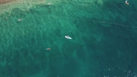 Aerial down view of a rocky beach of the Adriatic sea. Summer vacation time Stock Footage