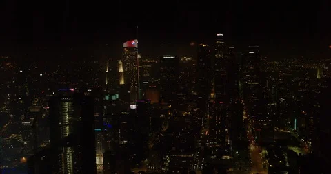 Aerial of downtown la, fireworks exploding in the background, night Stock Footage 102221648