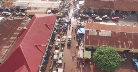 Aerial downtown road intersection activity in Guinea Conakry kindia Stock Footage 82399033