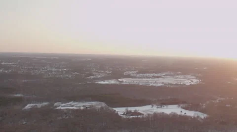 Aerial downtown snow sun Stock Footage