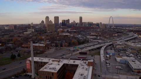 Aerial of downtown St. Louis with Gateway Arch 4k pull back Stock Footage