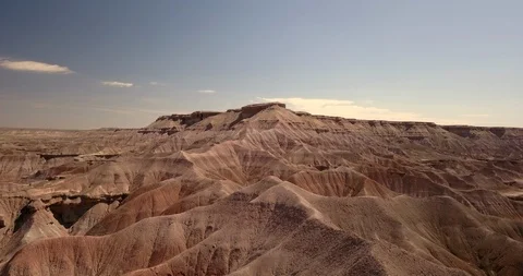 Aerial dramatic flight over painted desert mountain ridges in Arizona Stock Footage 111301961