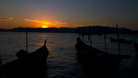 Aerial dramatic footage during sunset with fisherman boat Stock Footage 102813736