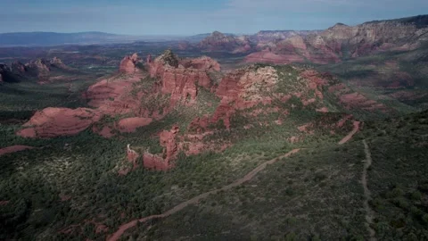 Aerial of dramatic red rock formations in Sedona Arizona Stock Footage 315415785