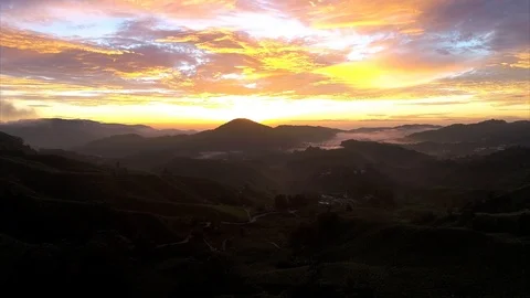 Aerial dramatic sunrise by drone at TEA Plantation, Cameron Highlands, Malaysia. Stock Footage 106111038