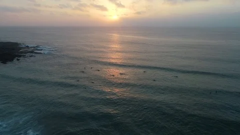 Aerial drift over surfers Stock Footage 107079283