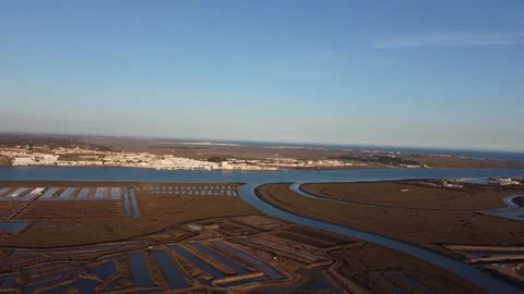 Aerial drive view of salt fields. Sunset cinematic shot. Stock-Footage 171420912