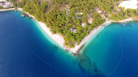 Aerial driving off from small hidden beach on Croatian coast. Stock Footage 80022880